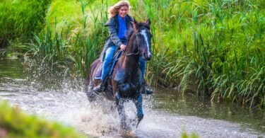 woman riding down stream