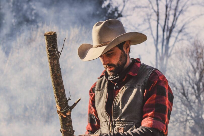 cowboy wearing hat with cattleman crease