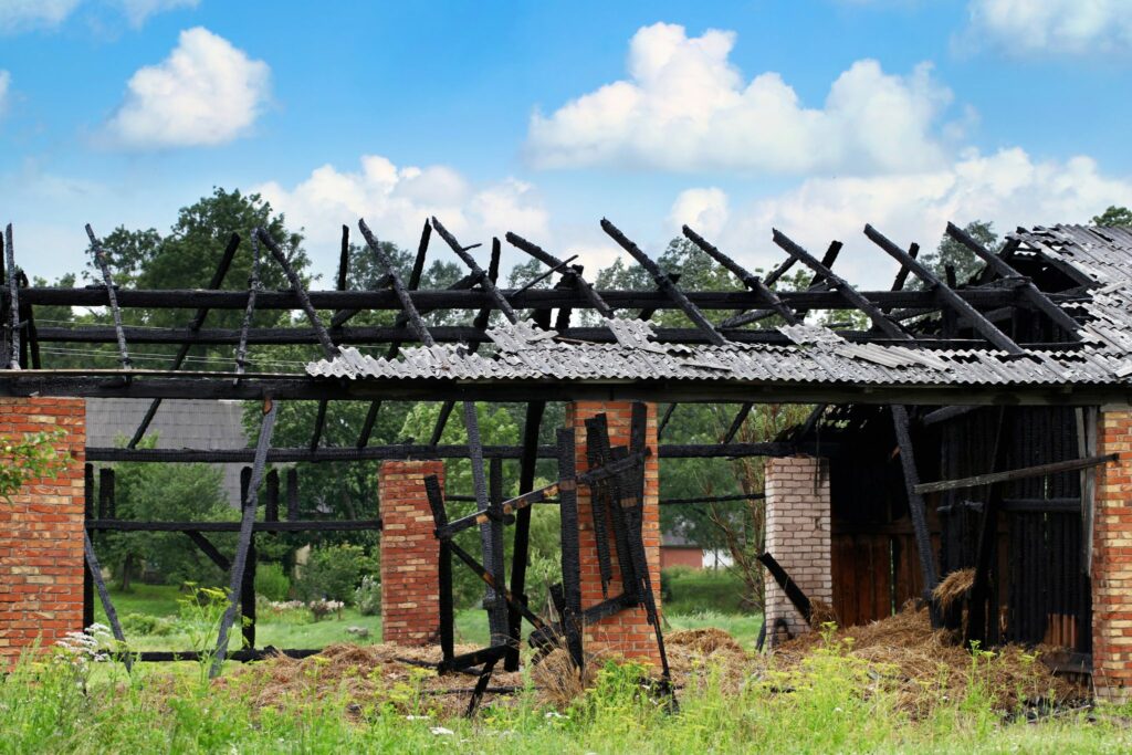 burned remains of horse barn