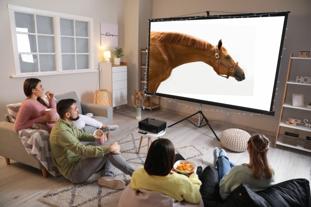 at home theater watching a horse movie