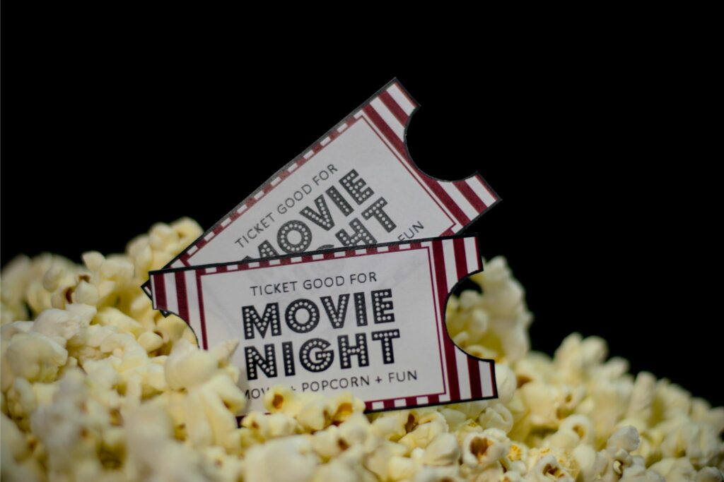 movie tickets in popcorn with dark background