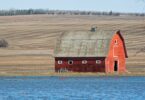 red barn in flooded field