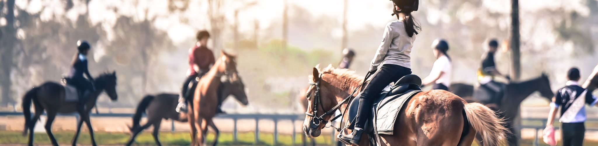 group of riders in arena