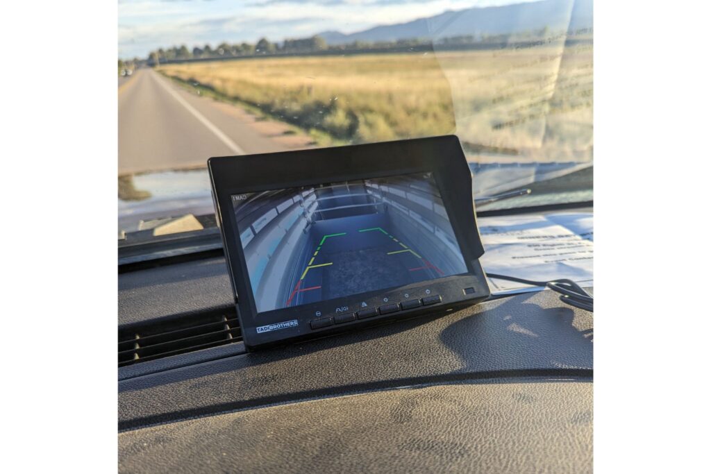 trailer camera monitor with road in background